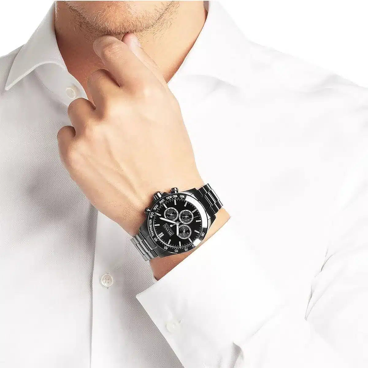 Hugo Boss chronograph watch on wrist with black dial and metal band