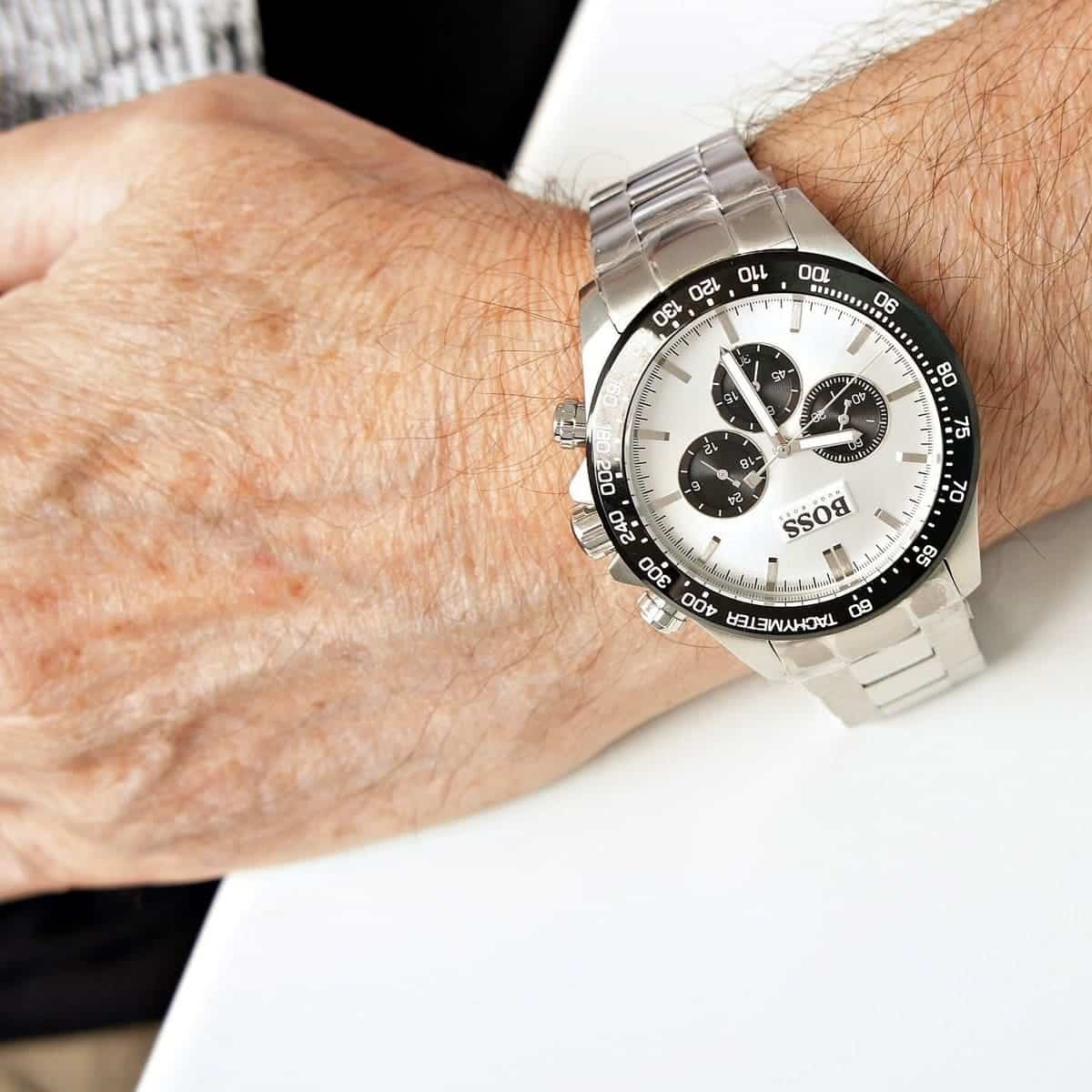 Hugo Boss Ikon chronograph watch worn on wrist showing silver dial and steel bracelet fit