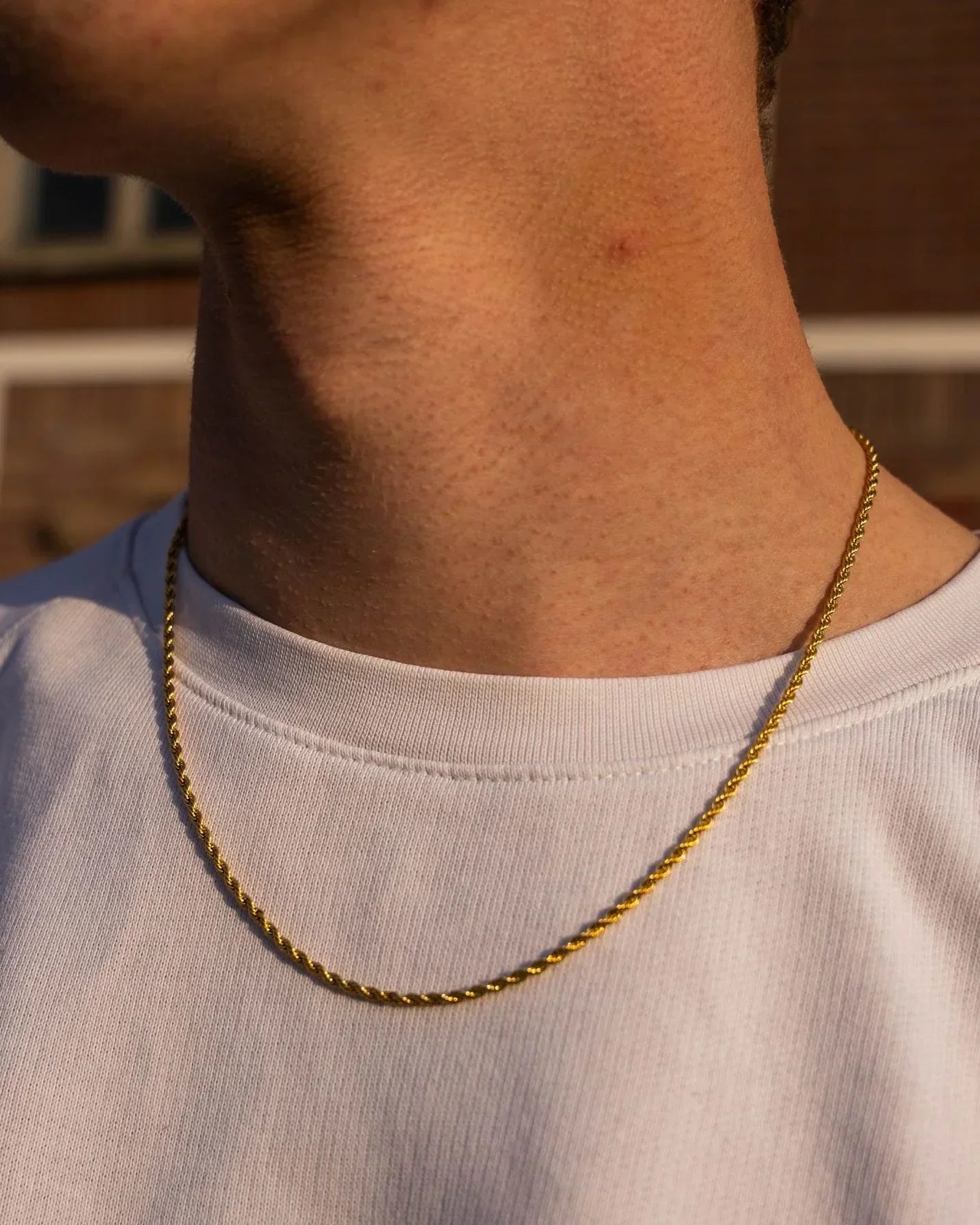 Big Daddy 2.5mm gold rope chain worn around neck on model