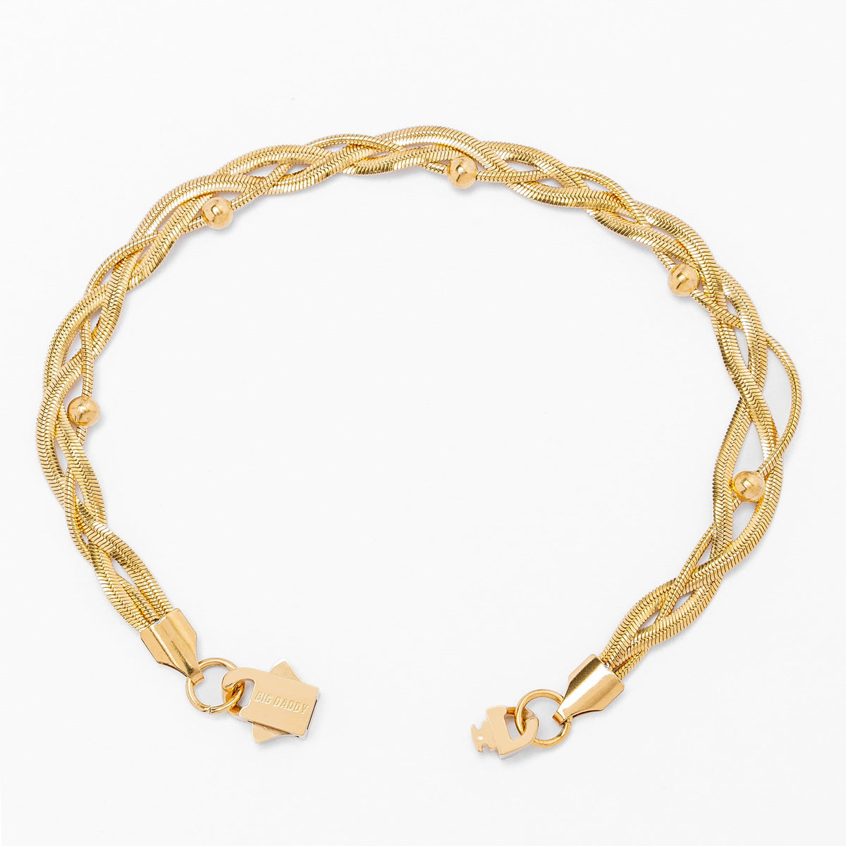 Big Daddy 3MM gold flat herringbone bracelet laid open showing full length