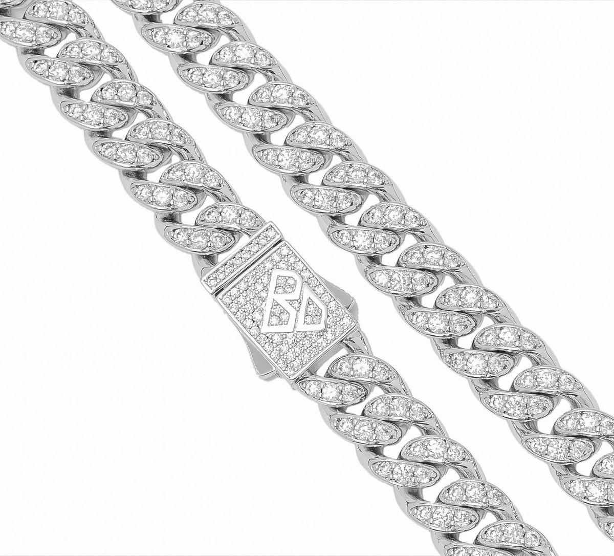 Close-up of iced out Cuban link chain with rhinestone detail and clasp