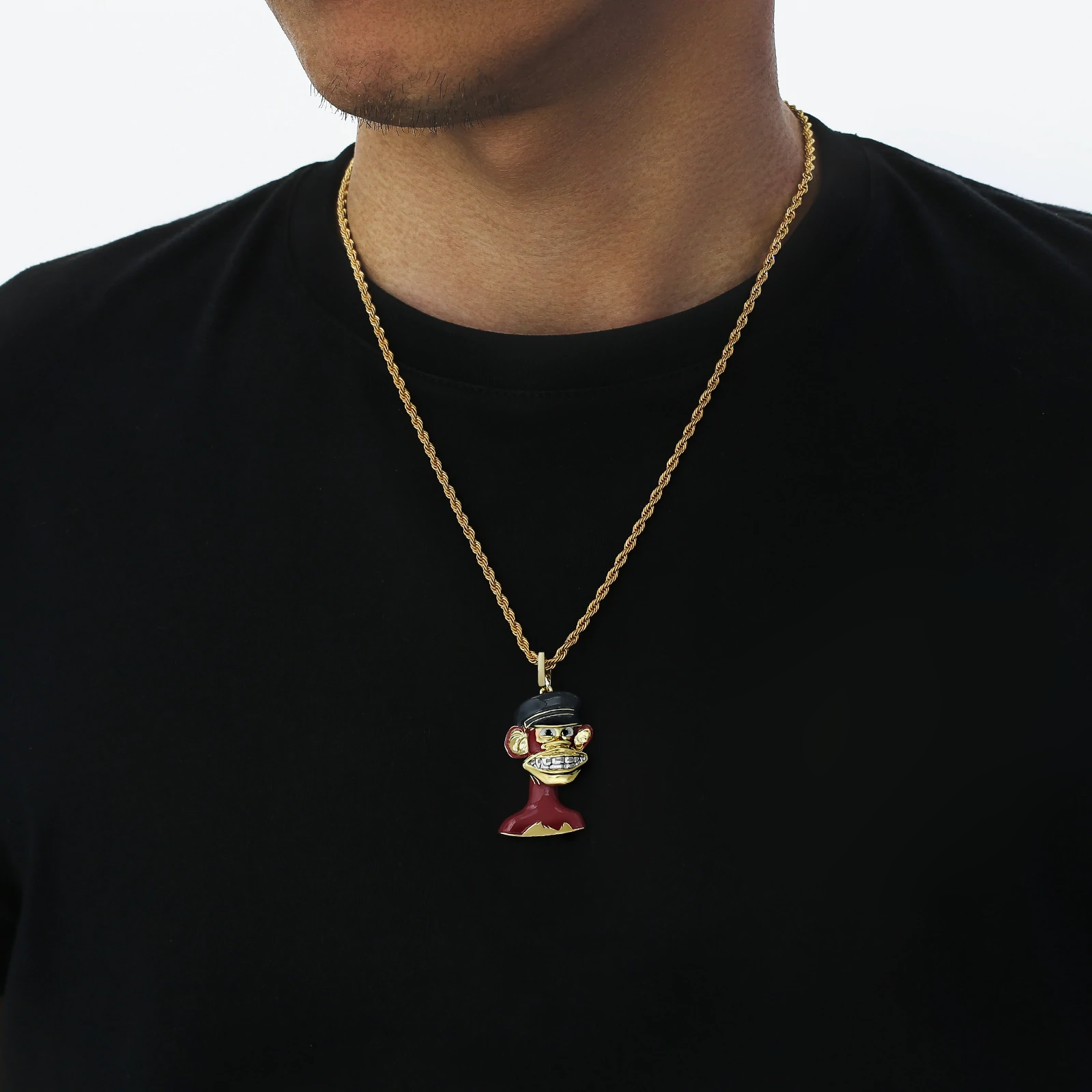 Big Daddy Bored Ape NFT pendant #6 worn on gold chain against black shirt