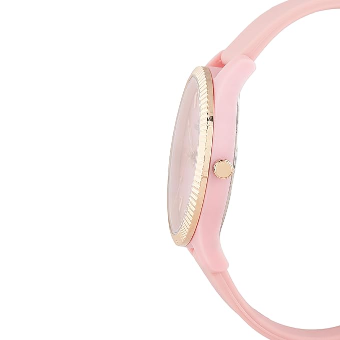 Daniel Klein pink watch showing profile view with gold crown and strap detail