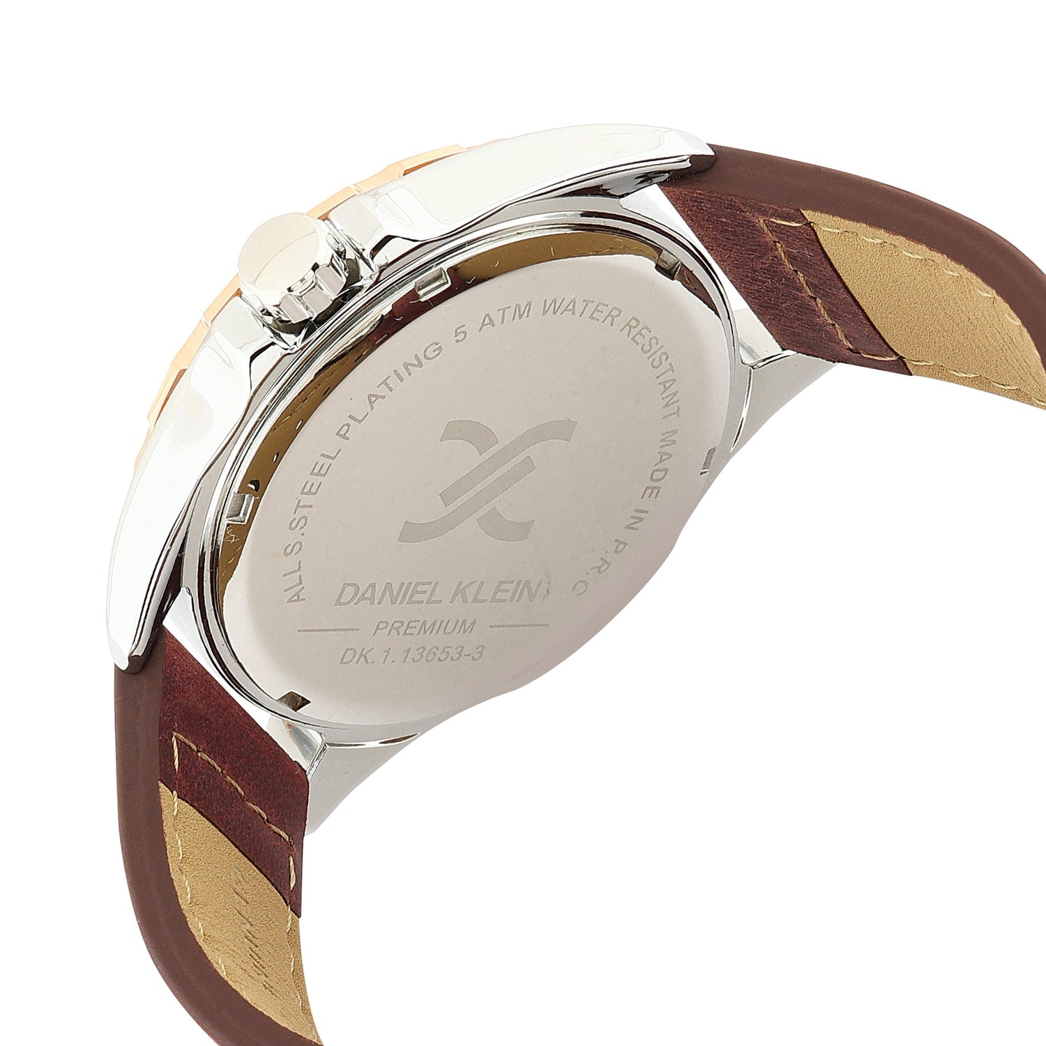 Caseback of Daniel Klein Premium watch with engraved details and brown leather strap