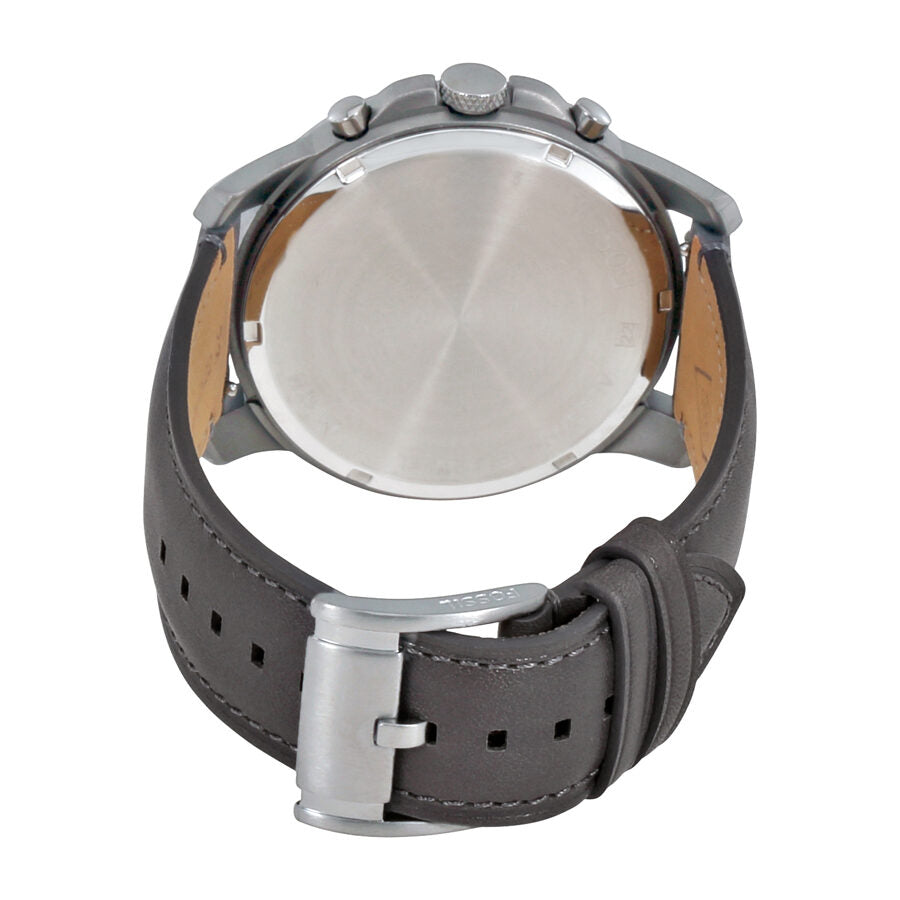 Fossil Grant watch caseback with stainless steel cover and gray leather strap visible