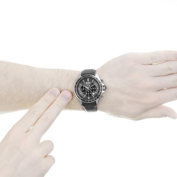 Hugo Boss chronograph watch on wrist showing black dial and leather strap fit