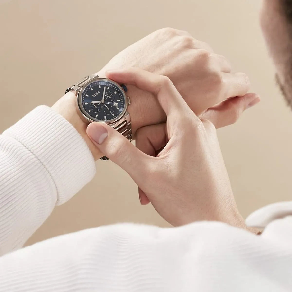 Hugo Boss One chronograph men's watch with blue dial worn on wrist