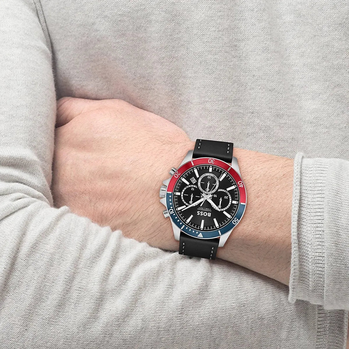 Hugo Boss Troper watch on wrist displaying three chronograph subdials and black dial face