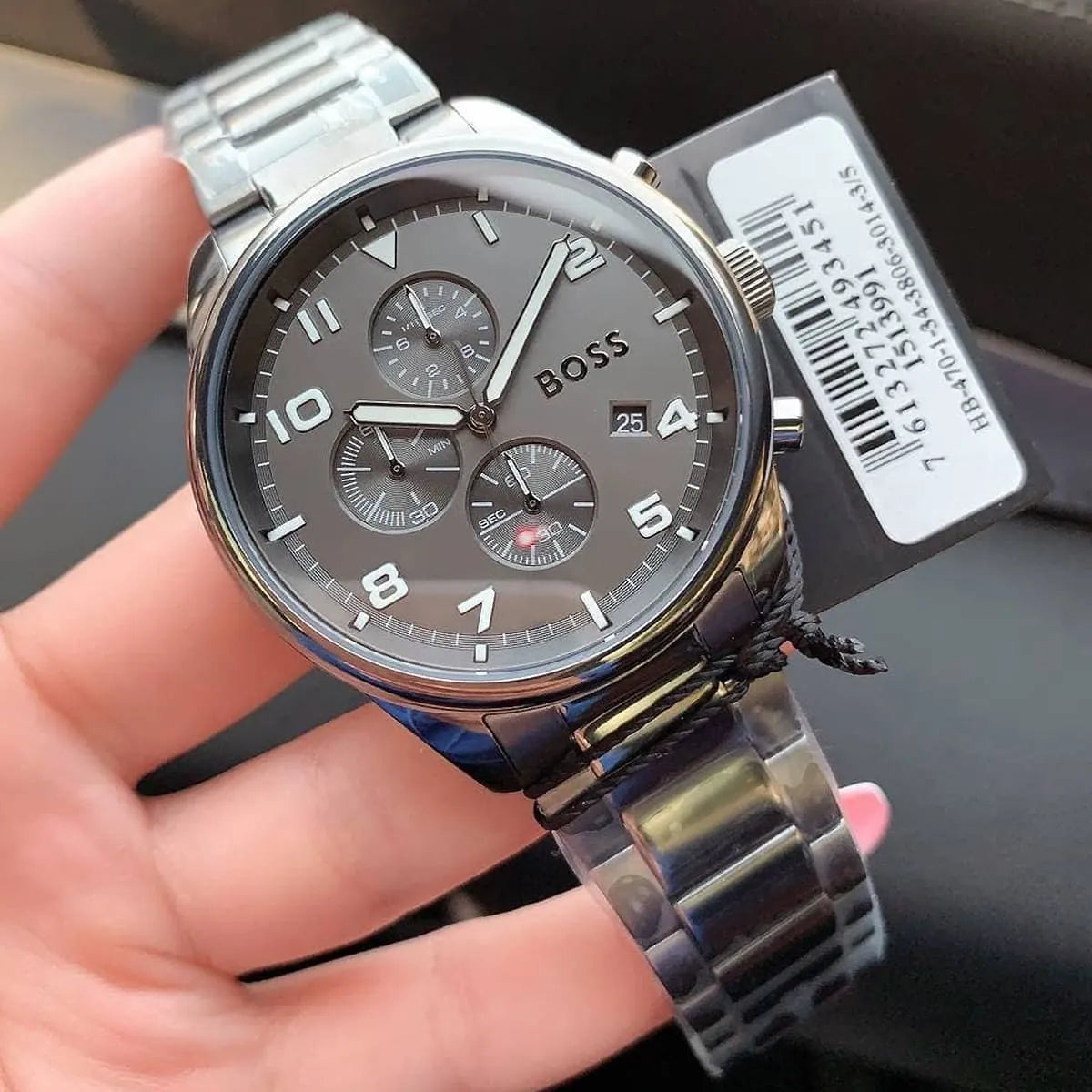 Hugo Boss View Chronograph held in hand with product tag