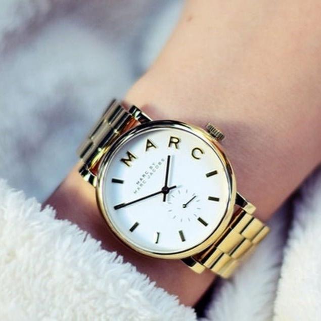 Marc by Marc Jacobs white dial gold-tone watch MBM3243 worn on wrist