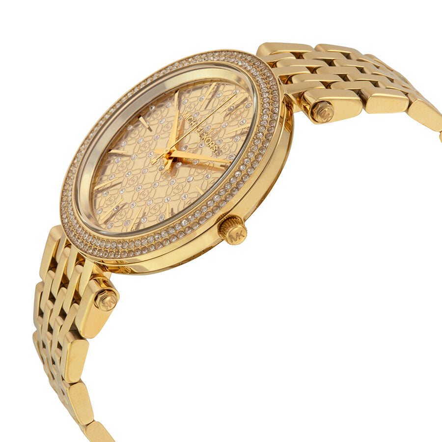 Michael Kors Darci watch shown at angle displaying crystal-bezel and gold-tone bracelet