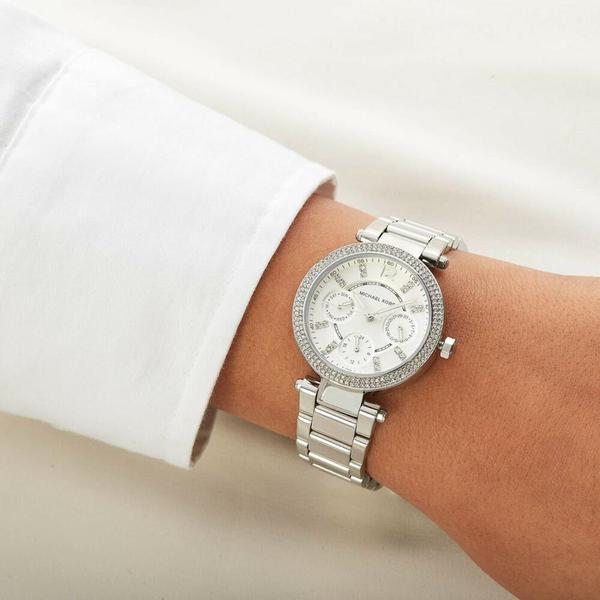 Michael Kors Parker MK5615 silver chronograph watch on wrist with metal bracelet