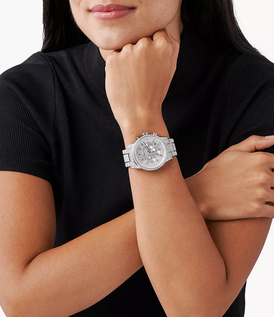 Michael Kors Ritz silver chronograph watch worn on wrist