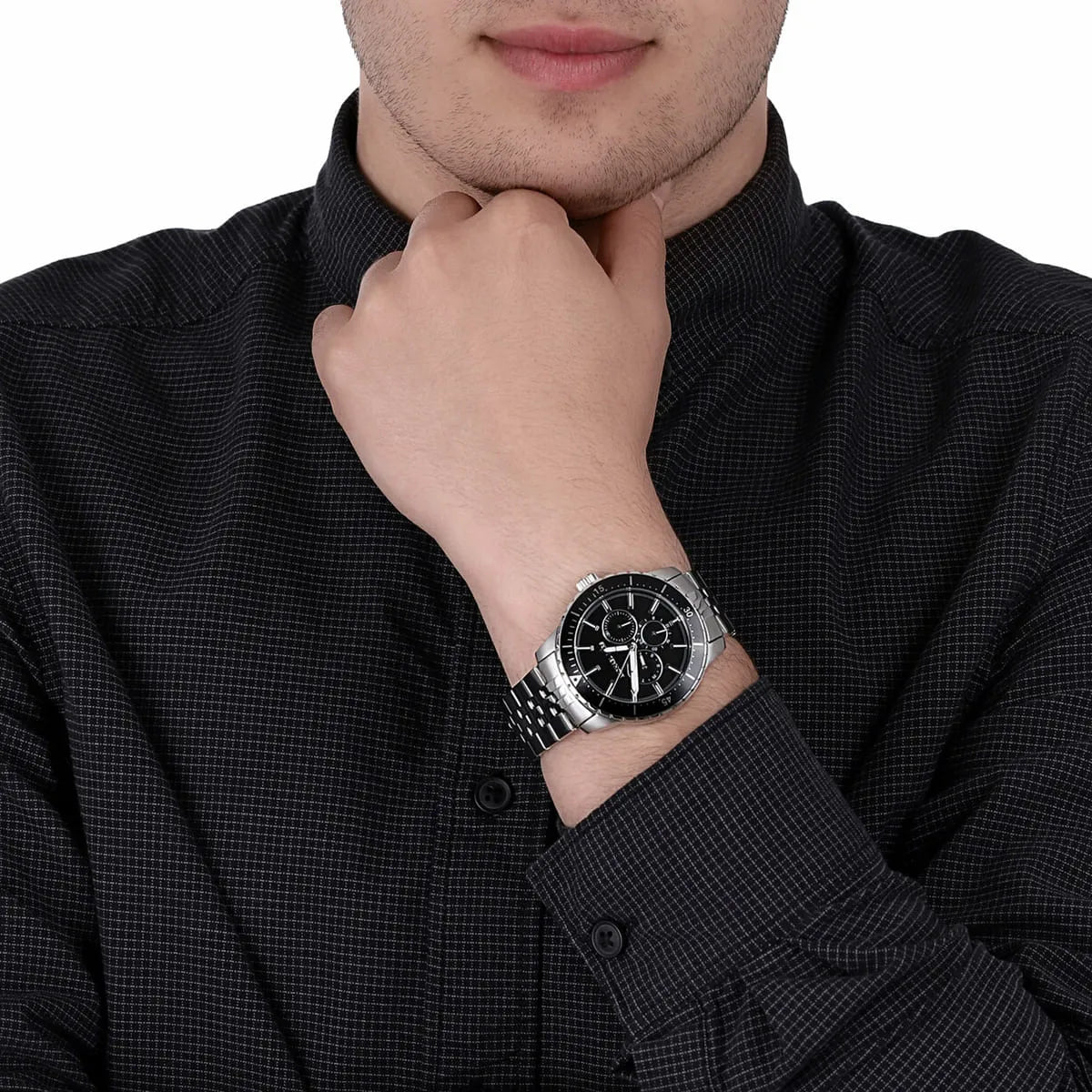 Michael Kors Cunningham multifunction watch worn on wrist showing black dial and silver bracelet
