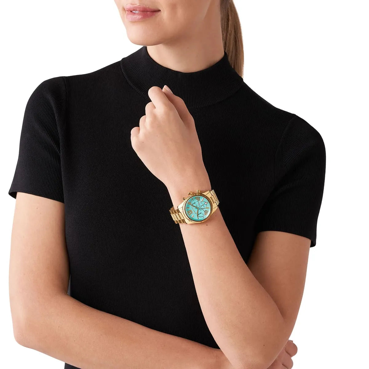 Michael Kors Lexington turquoise dial chronograph watch worn on wrist