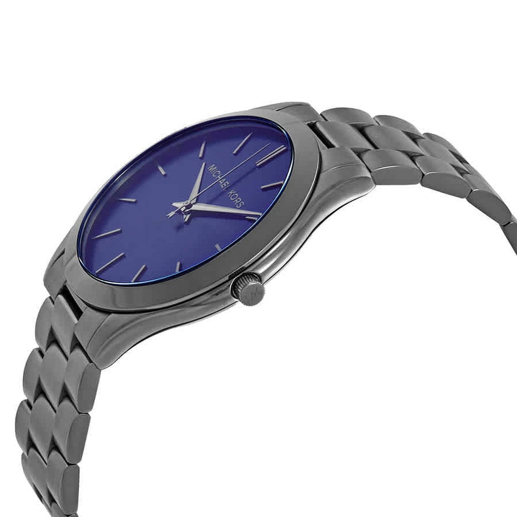 Michael Kors MK8584 Slim Runway watch at angle showing navy dial and gunmetal stainless steel bracelet