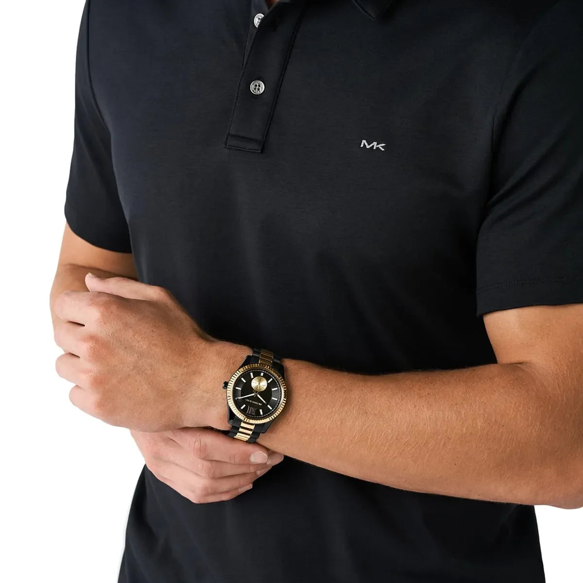 Michael Kors Lexington two-tone men's watch worn on wrist with black dial and gold accents