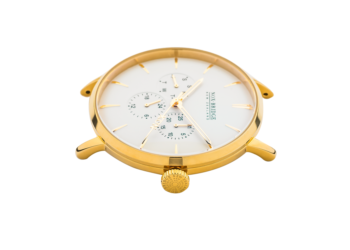 Top-down angle view of Alcyone 36MM gold watch with white chronograph dial and lugs