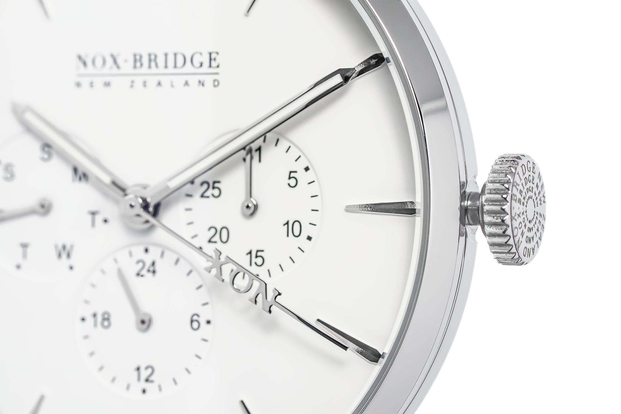 Close-up of Capella dial showing subdials, markers, and textured crown detail