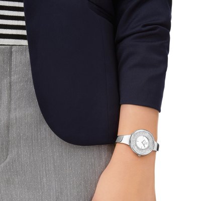 Swarovski Crystalline Pure women's watch worn on wrist with silver steel strap