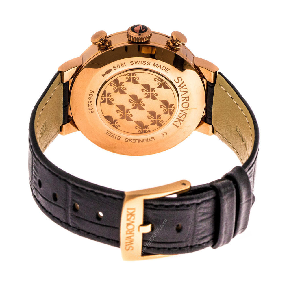 Caseback of Swarovski Lovely Crystals watch showing rose gold case, Swiss Made inscription, and black leather strap