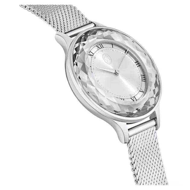 Swarovski Octea Nova angled view displaying faceted sapphire bezel and silver mesh strap