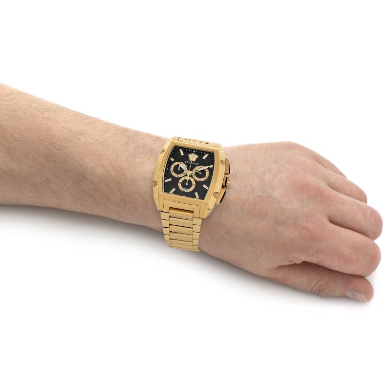 Versace Dominus chronograph watch worn on wrist showing black dial and gold steel bracelet