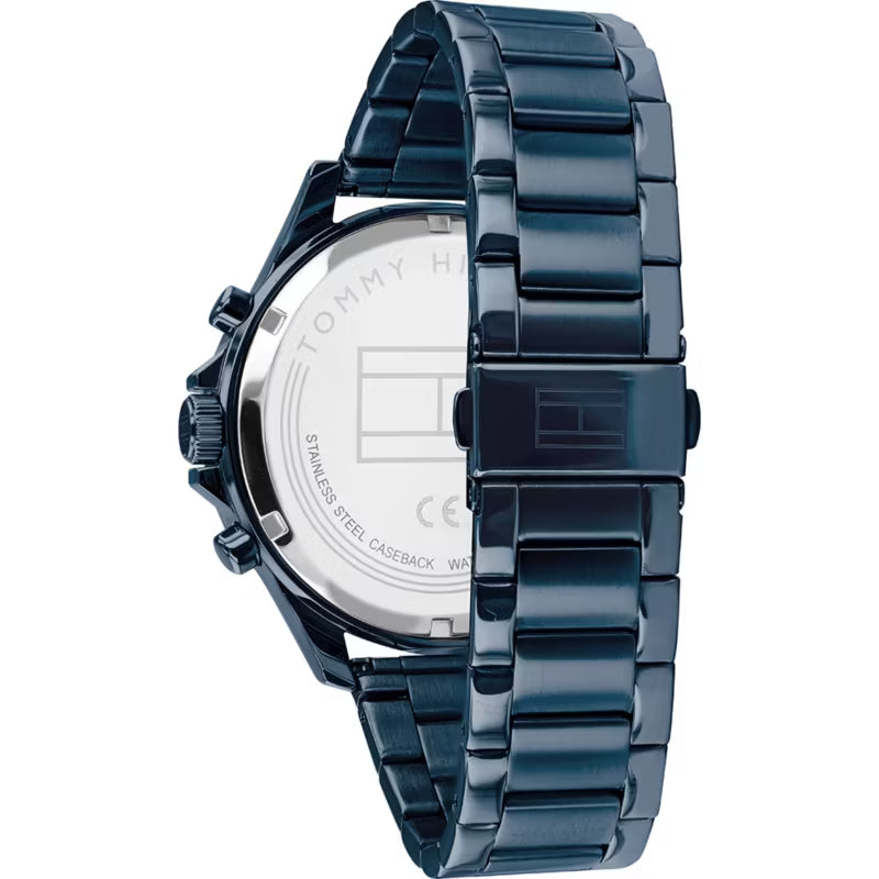 Case back of Tommy Hilfiger Ari watch showing blue stainless steel bracelet side view