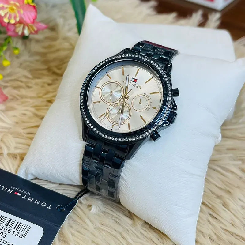 Tommy Hilfiger Ari watch on wrist showing silver dial and chronograph subdials