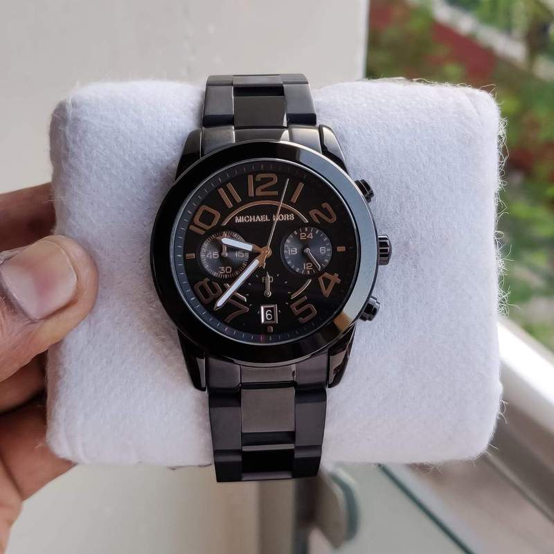 Michael Kors Mercer Chronograph Black Dial Men's Watch MK8330 Water resistance: 100 meters / 330 feet Movement: Quartz  