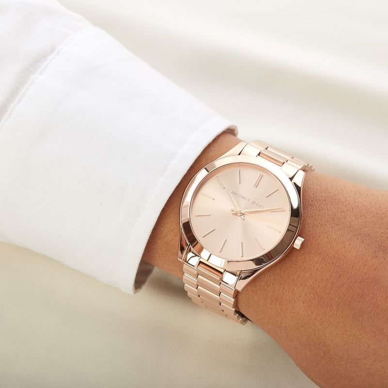 Michael Kors Slim Runway Rose Gold-tone Dial Unisex Watch MK3197 Water resistance: 50 meters / 165 feet Movement: Quartz  