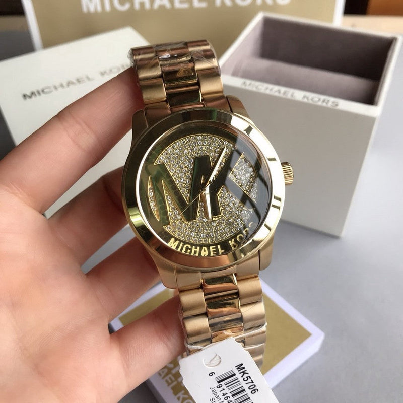 Michael Kors Runway Gold Crystal Pave Dial Bling Watch MK5706 Water resistance: 100 meters / 330 feet Movement: Quartz  