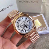 Michael Kors Cooper Chronograph White Dial Ladies Watch MK5929 Water resistance: 100 meters / 330 feet Movement: Quartz  