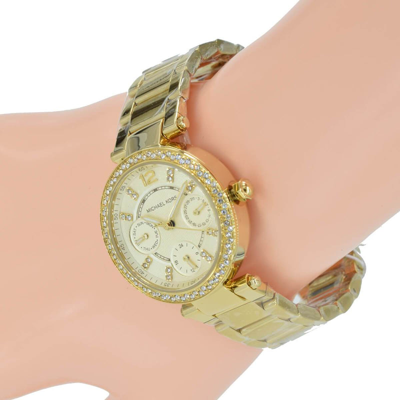 Michael Kors Mini Parker Champagne Glitz Dial Steel Ladies Watch MK6056 Water resistance: 50 meters / 165 feet Movement: Quartz  