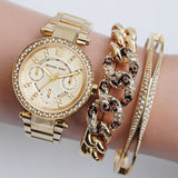 Michael Kors Mini Parker Champagne Glitz Dial Steel Ladies Watch MK6056 Water resistance: 50 meters / 165 feet Movement: Quartz  
