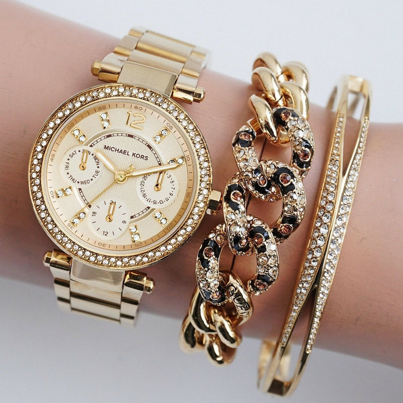 Michael Kors Mini Parker Champagne Glitz Dial Steel Ladies Watch MK6056 Water resistance: 50 meters / 165 feet Movement: Quartz  