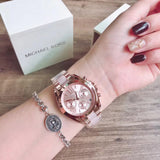 Michael Kors Bradshaw Mini Chronograph Rose Dial Steel Ladies Watch MK6066 Water resistance: 100 meters / 330 feet Movement: Quartz
