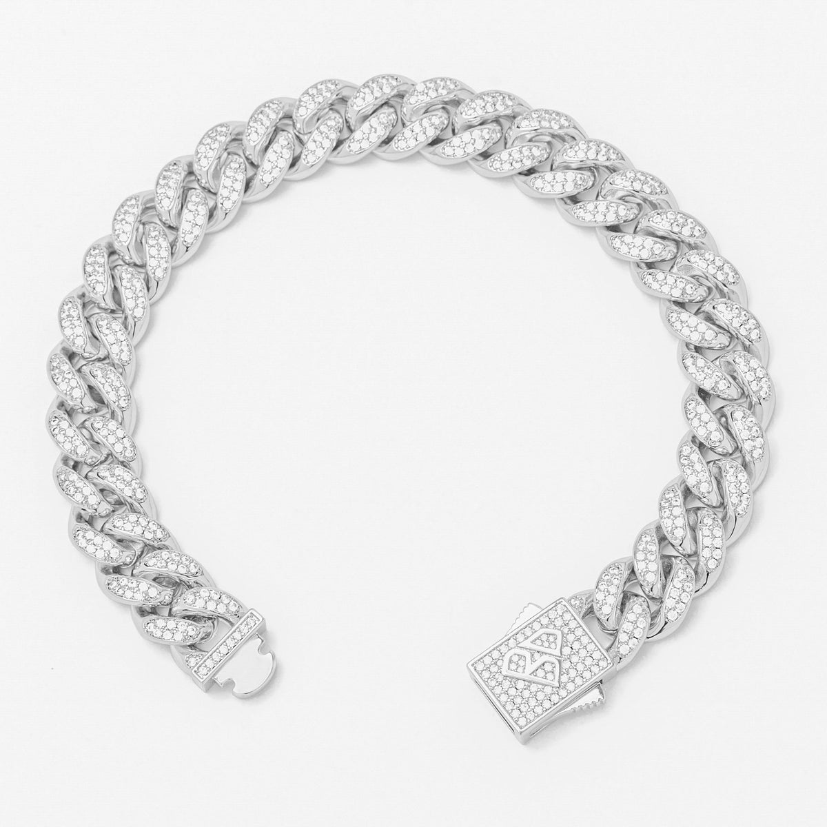 Silver cubic zirconia iced Cuban link bracelet shown from side angle with pave box clasp