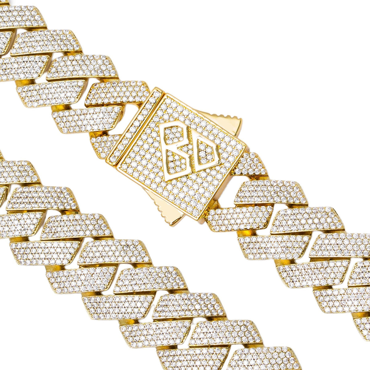 Cuban link chain with gold clasp detail and cubic zirconia setting