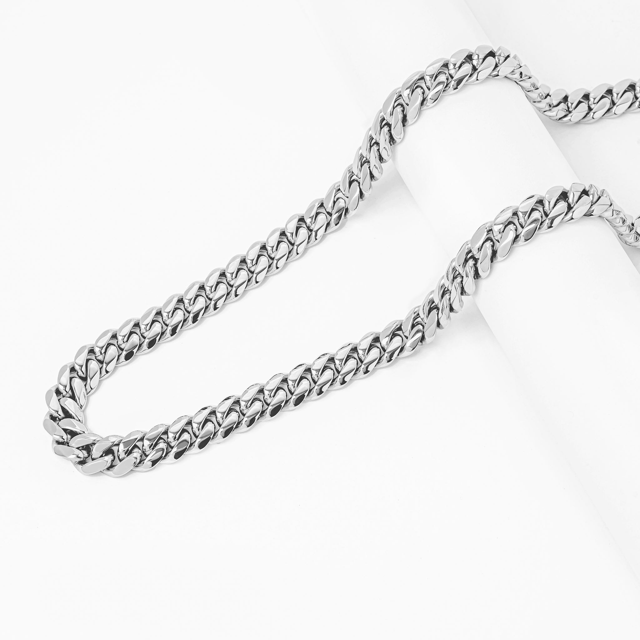 Two 8mm Cuban link chains displayed side by side on white background