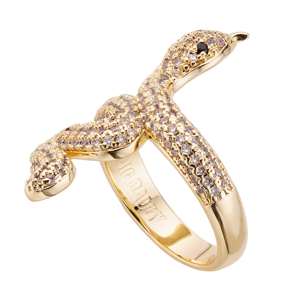 Gold snake ring with CZ pavé setting, wrapped design with black onyx eyes