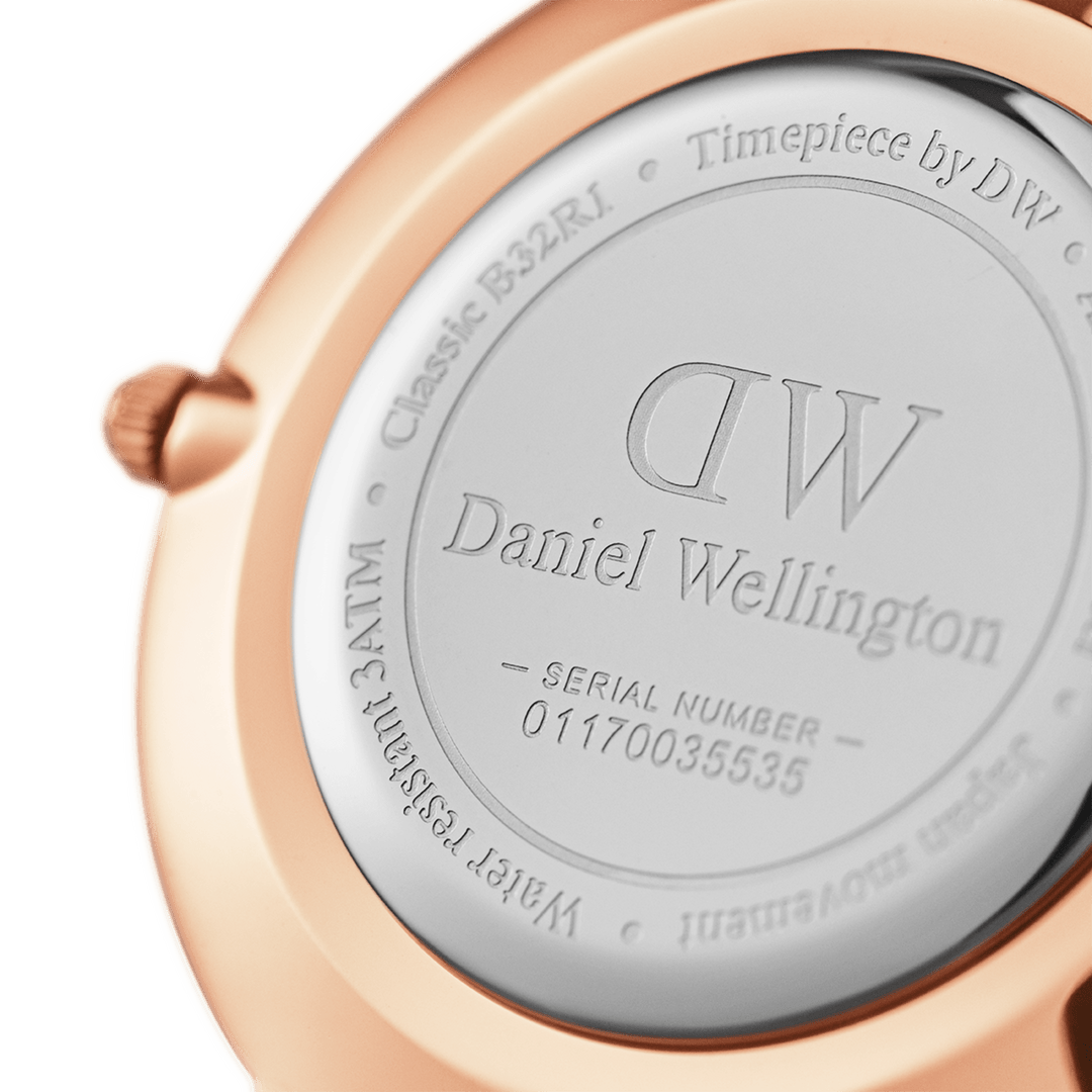 Daniel Wellington Petite 32mm Black Rose Gold Dial White Leather Strap DW00100283