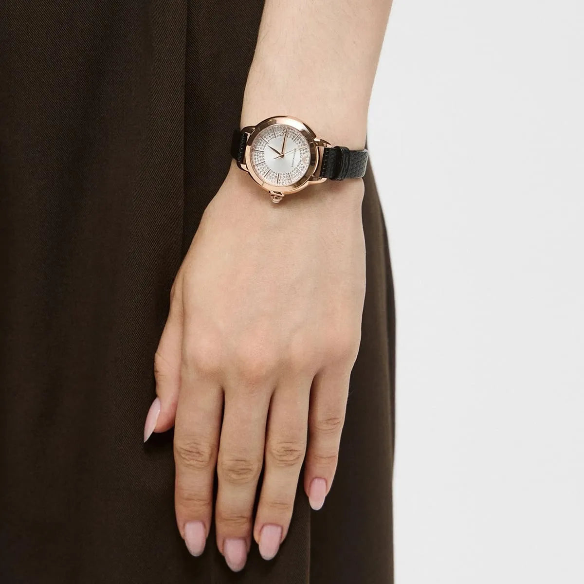 Emporio Armani Mia AR11631 rose gold watch worn on wrist with black leather strap