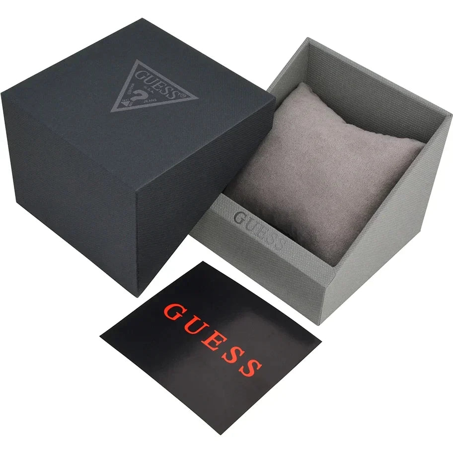 Guess watch box opened showing dark exterior with logo, gray interior with cushioned pillow, and Guess branded card