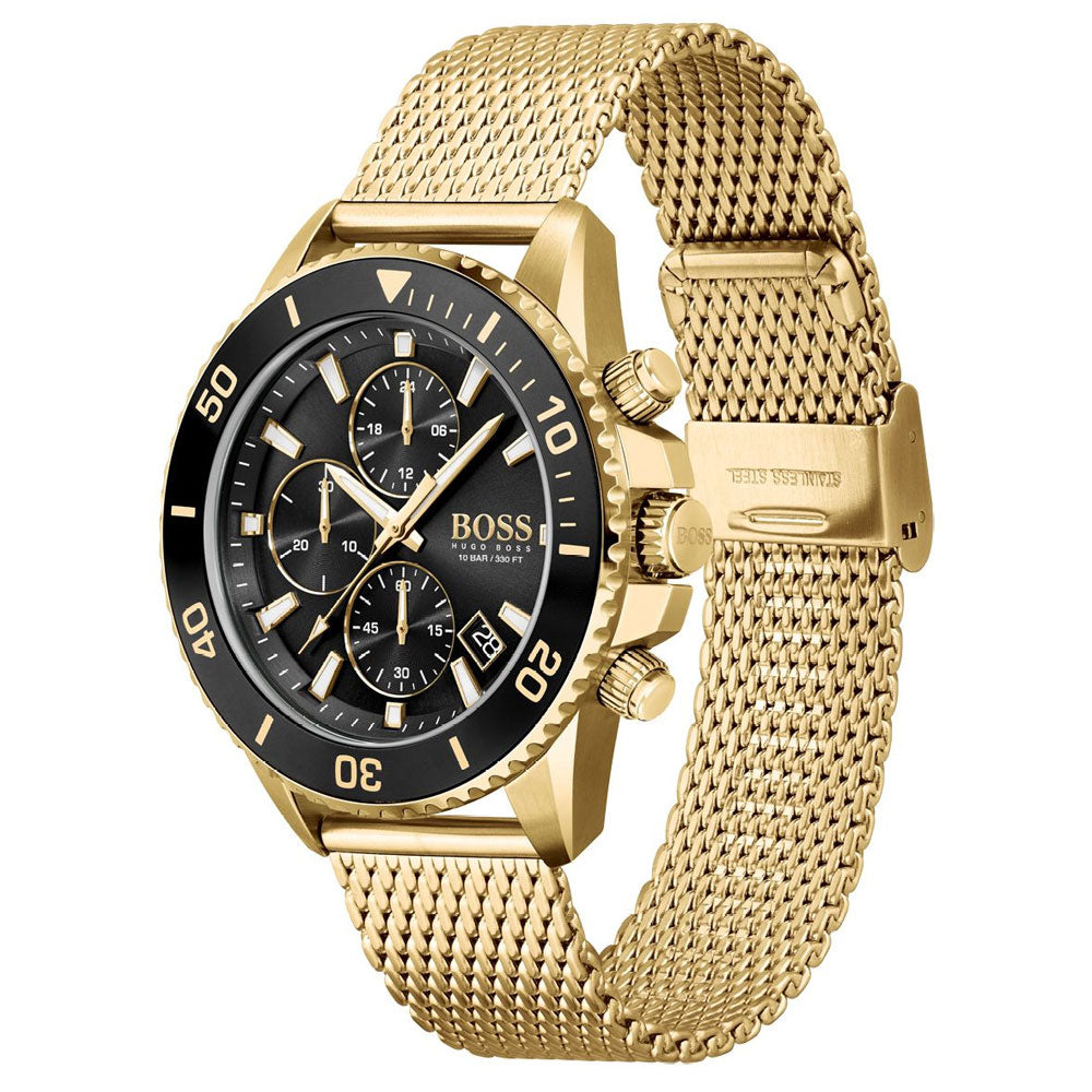 Hugo Boss Admiral chronograph on wrist showing gold case, black dial, and mesh bracelet