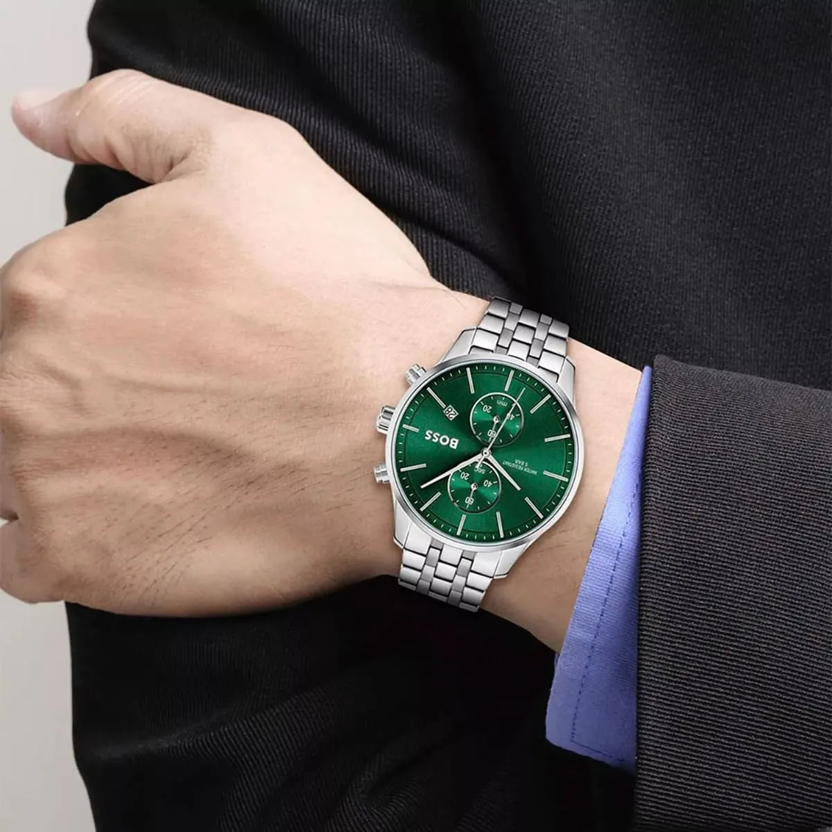 Hugo Boss Associate chronograph watch worn on wrist showing green dial and chronograph subdials