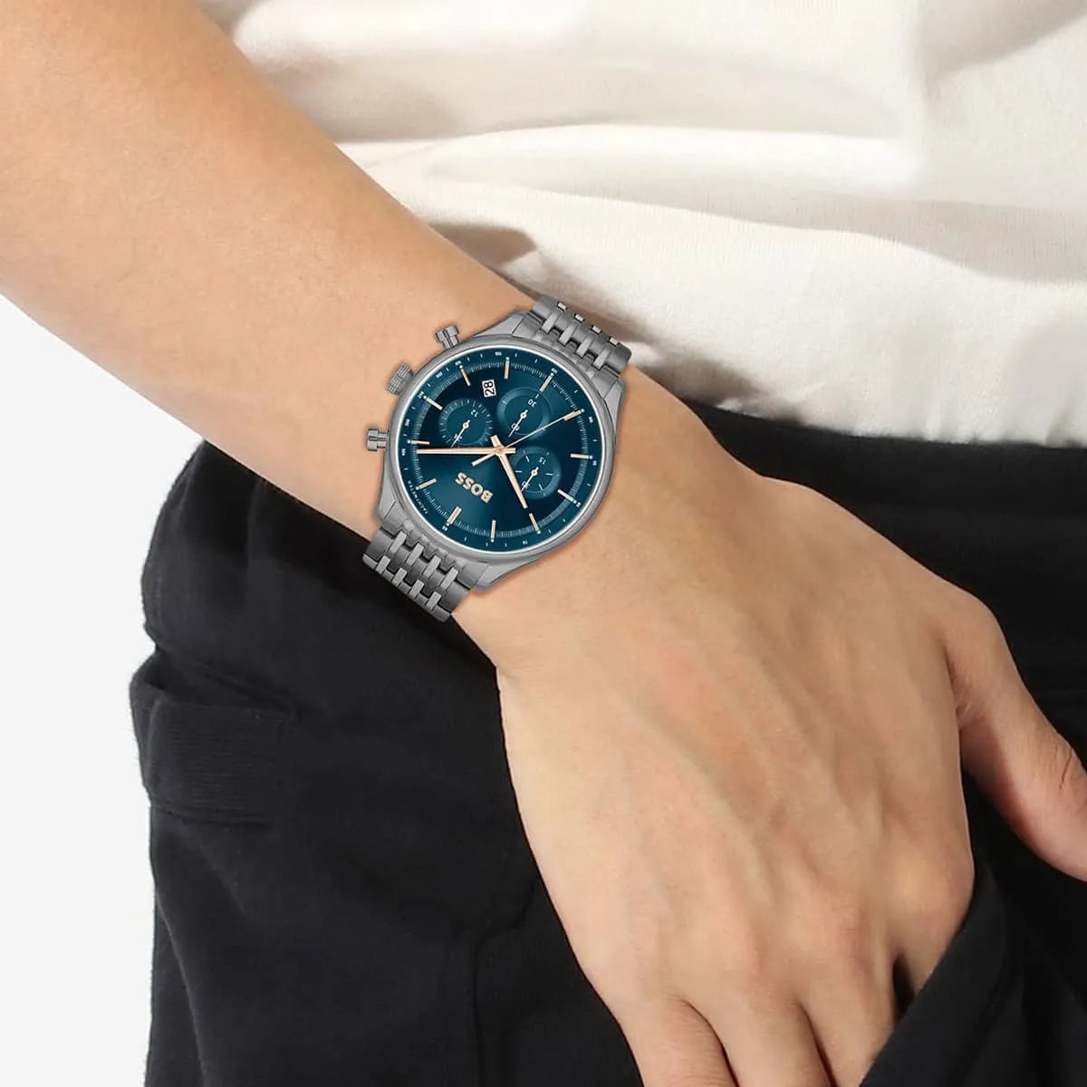 Hugo Boss Gregor chronograph watch worn on wrist with blue dial and steel bracelet
