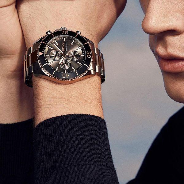 Hugo Boss Ocean Edition chronograph watch on wrist showing black dial and rose gold accents