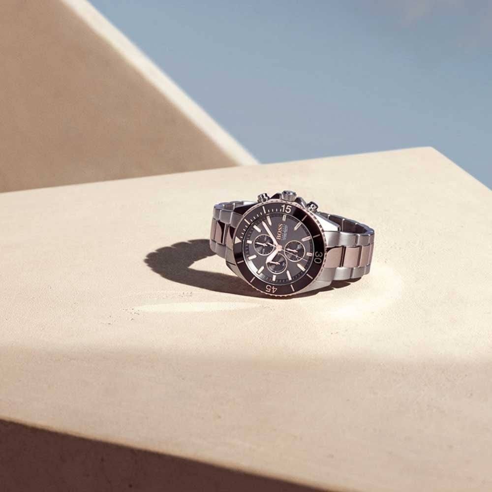 Hugo Boss Ocean Edition chronograph two-tone men's watch worn on wrist outdoors