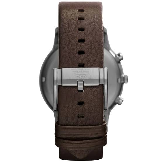 Watch with brown leather strap on a white background